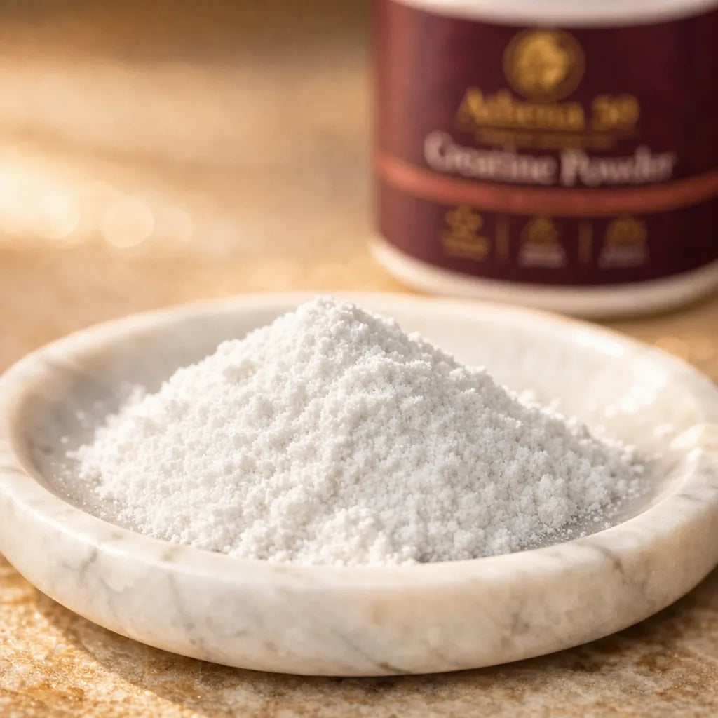 Macro of the unflavored creatine powder beside the tub