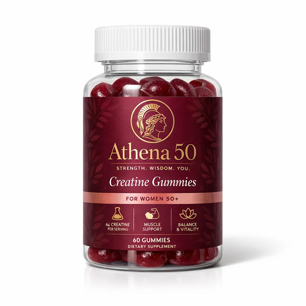 Athena 50 Creatine Gummies bottle on white marble with two ruby gummies beside it